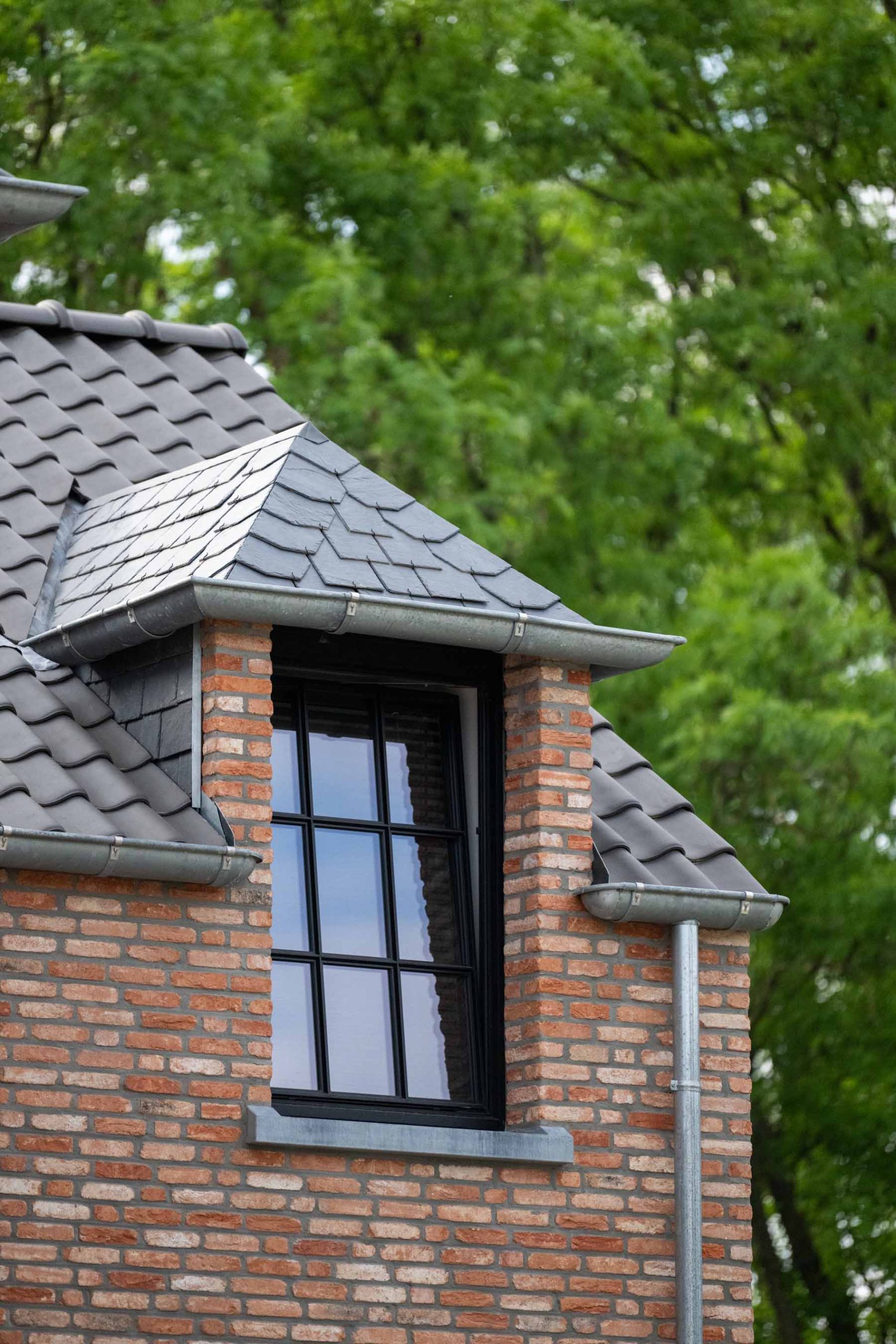 Dakwerken Bilzen — gevelbekleding aansluitend op het dak